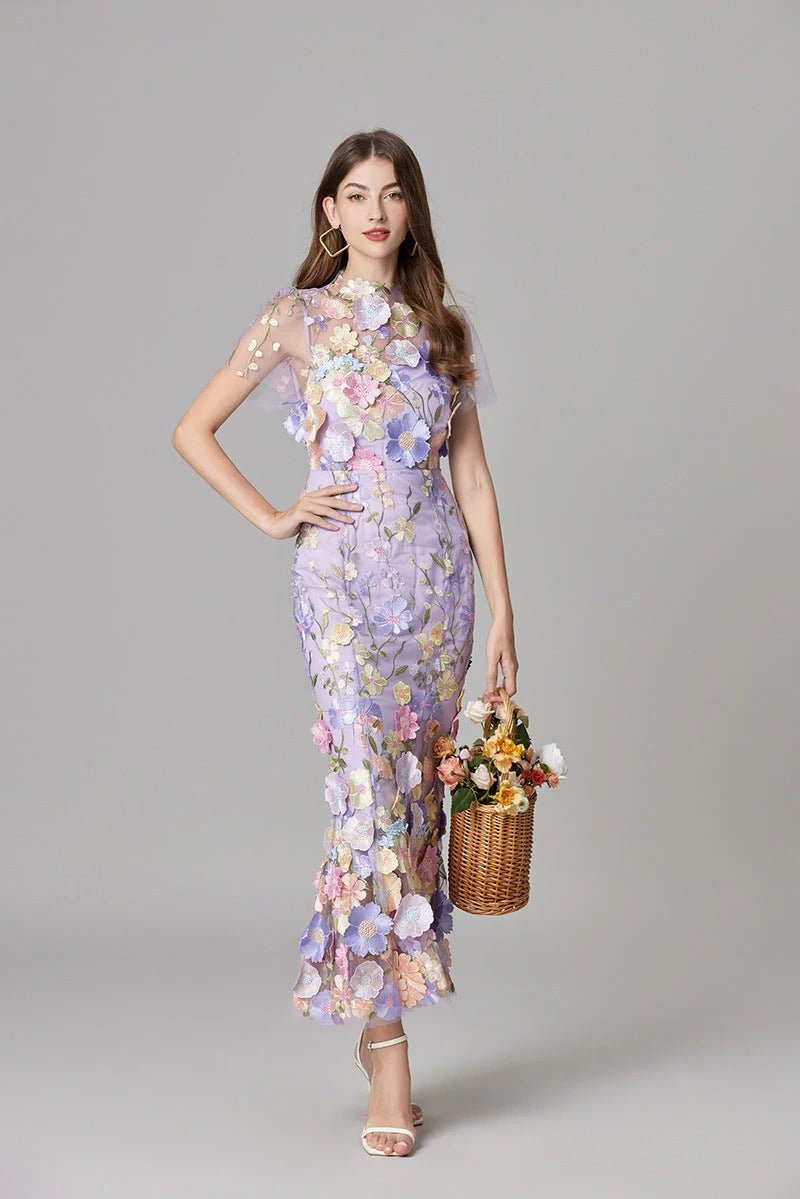 Formal Scarlett maxi dress, sleeveless, showcasing stunning floral appliques. Elegant evening gown.