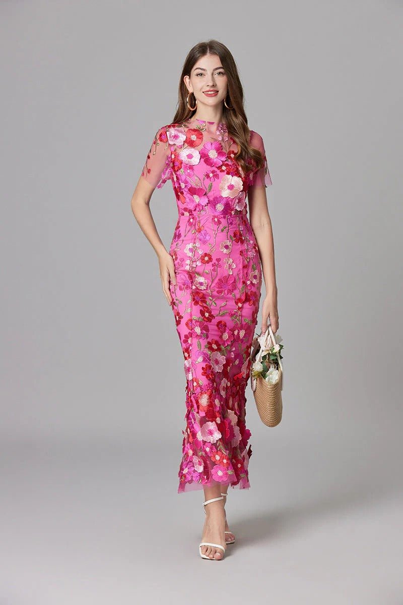 Women's Scarlett maxi dress featuring delicate floral appliques and a sleeveless design.