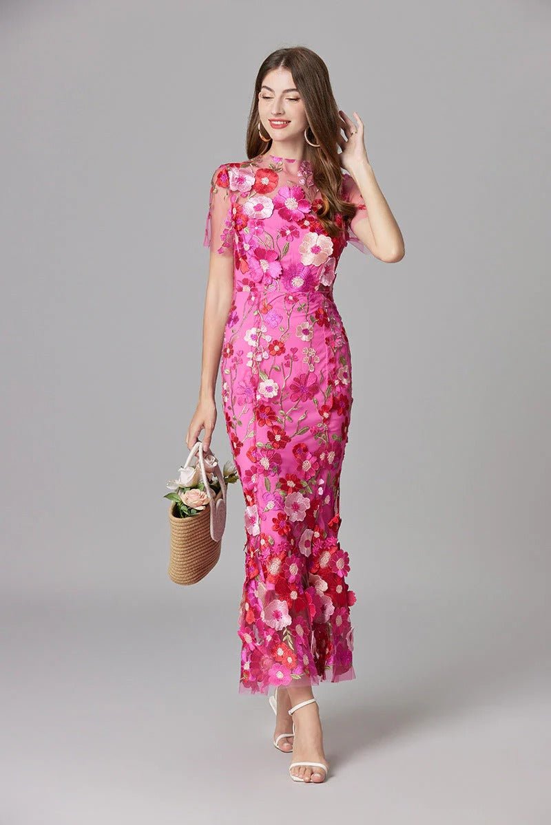 Beautiful Scarlett sleeveless maxi dress with exquisite floral appliques. Perfect women's party wear.