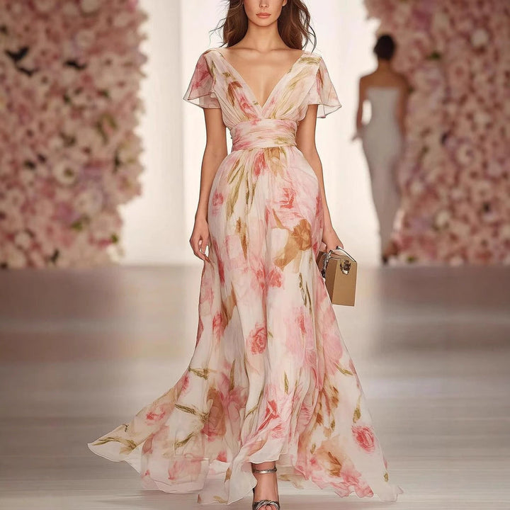 "Women's floral fit and flare maxi dress with deep V-neck and flutter sleeves, featuring an elegant and charming silhouette."