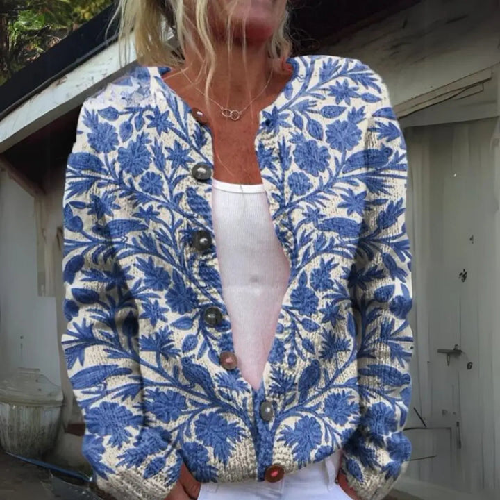 Relaxed fit women's floral button-up cardigan vest. Versatile knit outerwear for autumn and winter fashion.