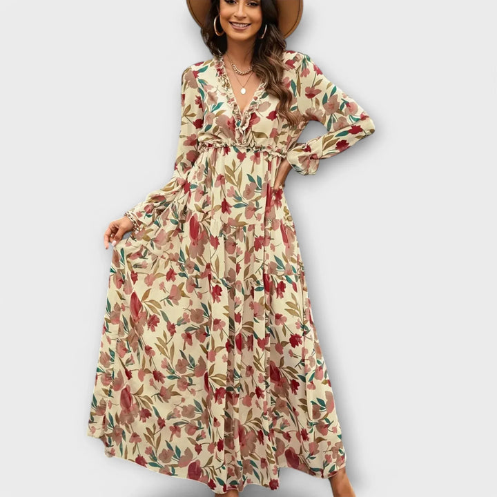 Stylish floral pattern maxi dress for women, showcasing a charming ruffled V-neck & graceful tiered skirt.