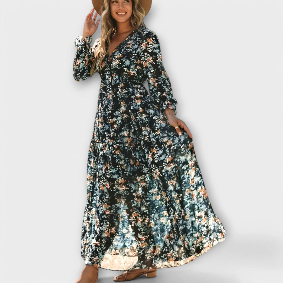 Beautiful women's long floral dress with a sophisticated ruffled V-neckline and elegant tiered skirt.