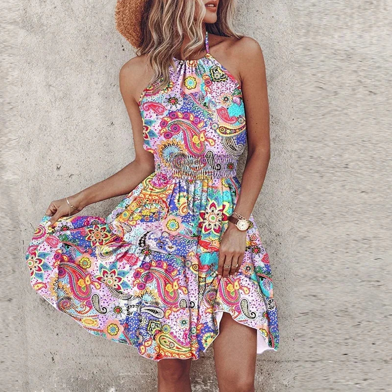 Casual women's floral halter mini dress with smocked waist, ideal for warm weather outfits.