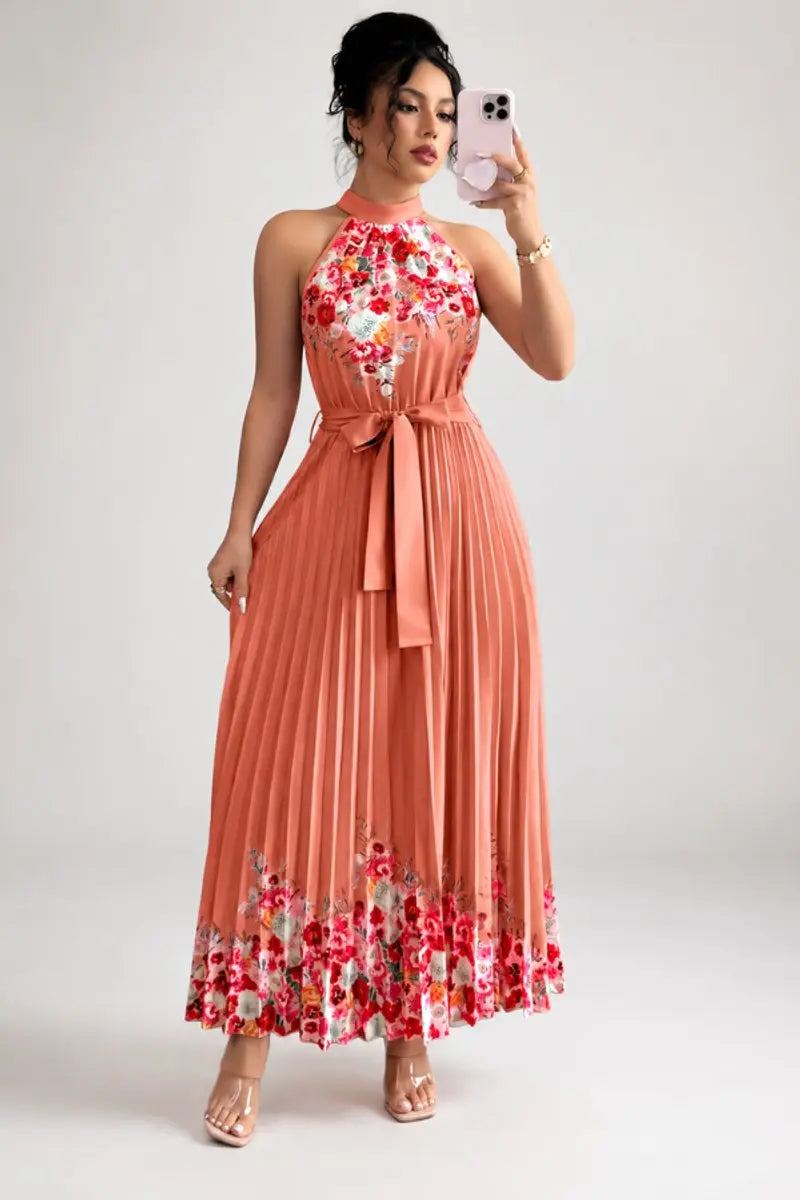 Unique halter-neck floral maxi dress, pleated for elegance, ideal as a women's evening gown.