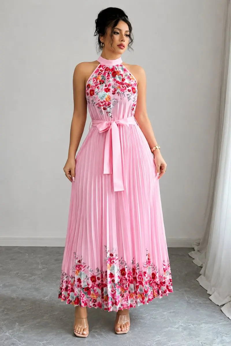 Stunning women's pleated floral maxi dress featuring a chic halter neckline. Ideal evening gown.