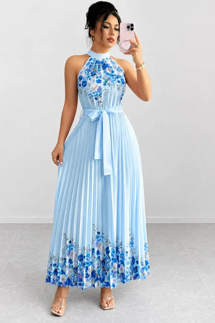 Beautiful floral halter evening gown, perfect as a wedding guest dress or special occasion attire.