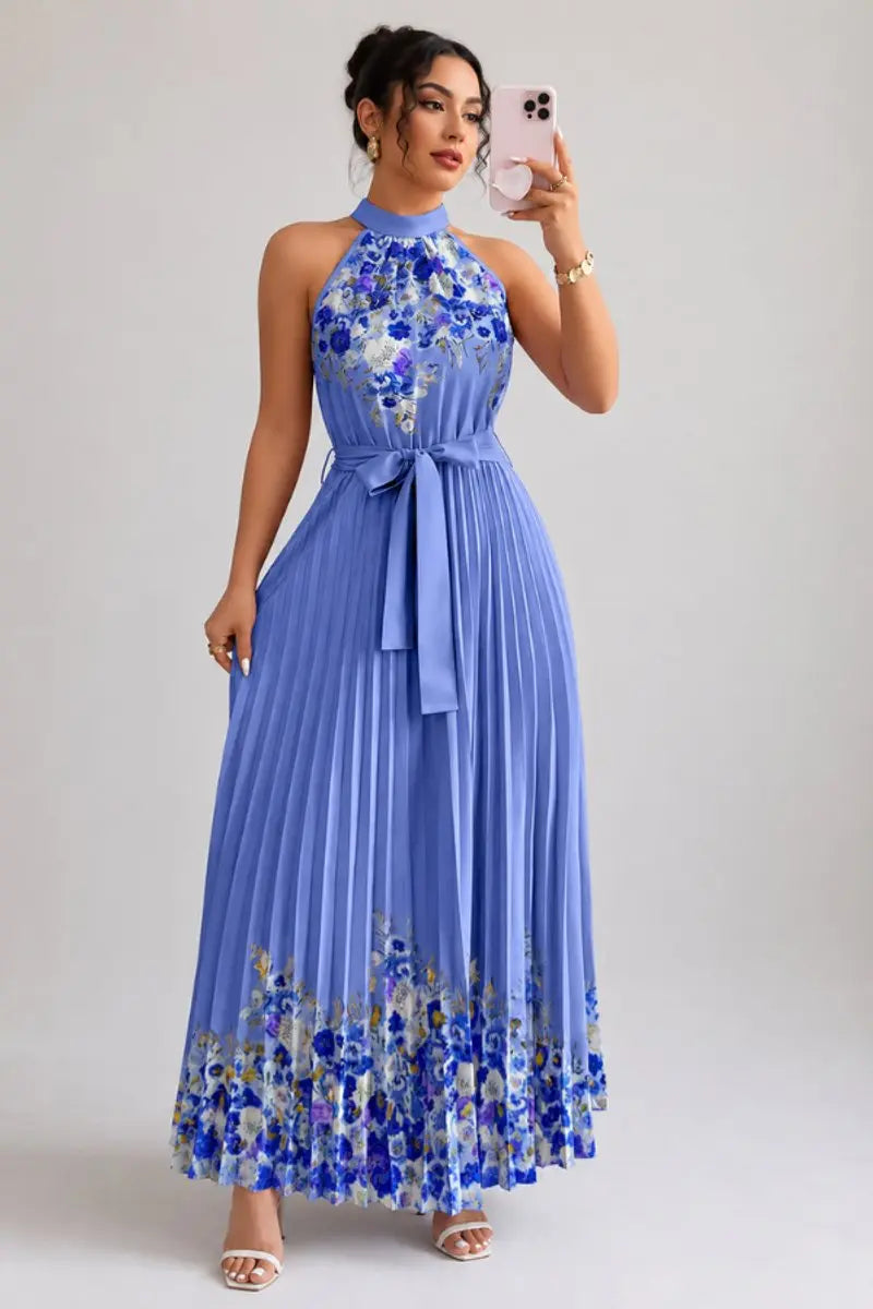 Formal women's floral halter neck evening gown with elegant pleats and maxi length.