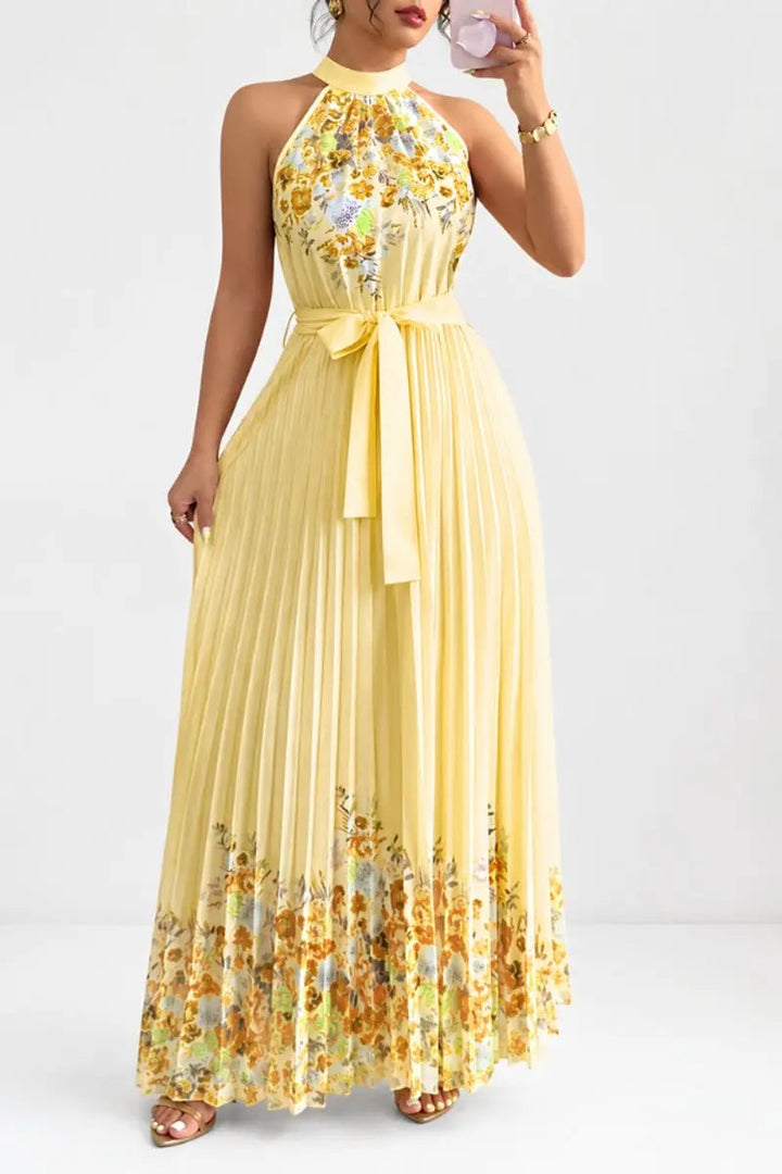 Vibrant floral pleated maxi dress, a chic halter neck formal gown for women's special occasions.