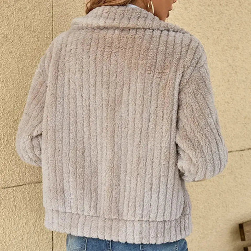 Comfortable women's fluffy zip-up quilted jacket, excellent warm outerwear for cold weather layering.