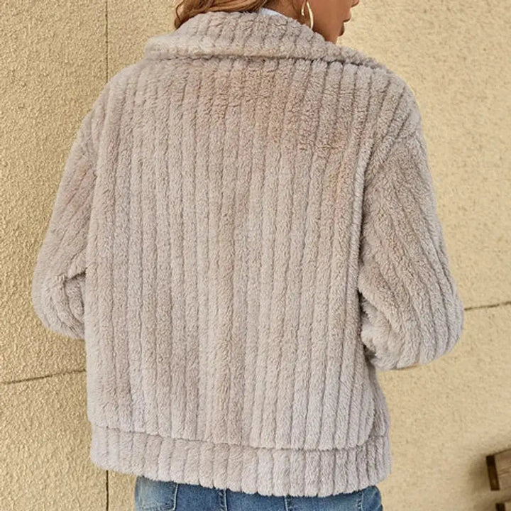 Comfortable women's fluffy zip-up quilted jacket, excellent warm outerwear for cold weather layering.