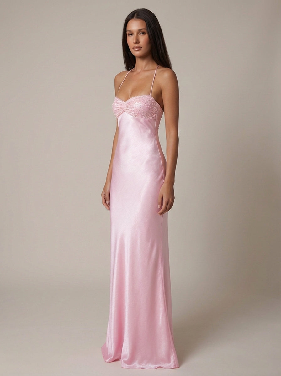 Formal halter neck maxi dress for special occasions, prom, or evening party. Elegant women's wear.