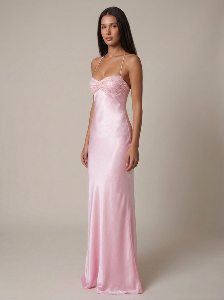 Formal halter neck maxi dress for special occasions, prom, or evening party. Elegant women's wear.
