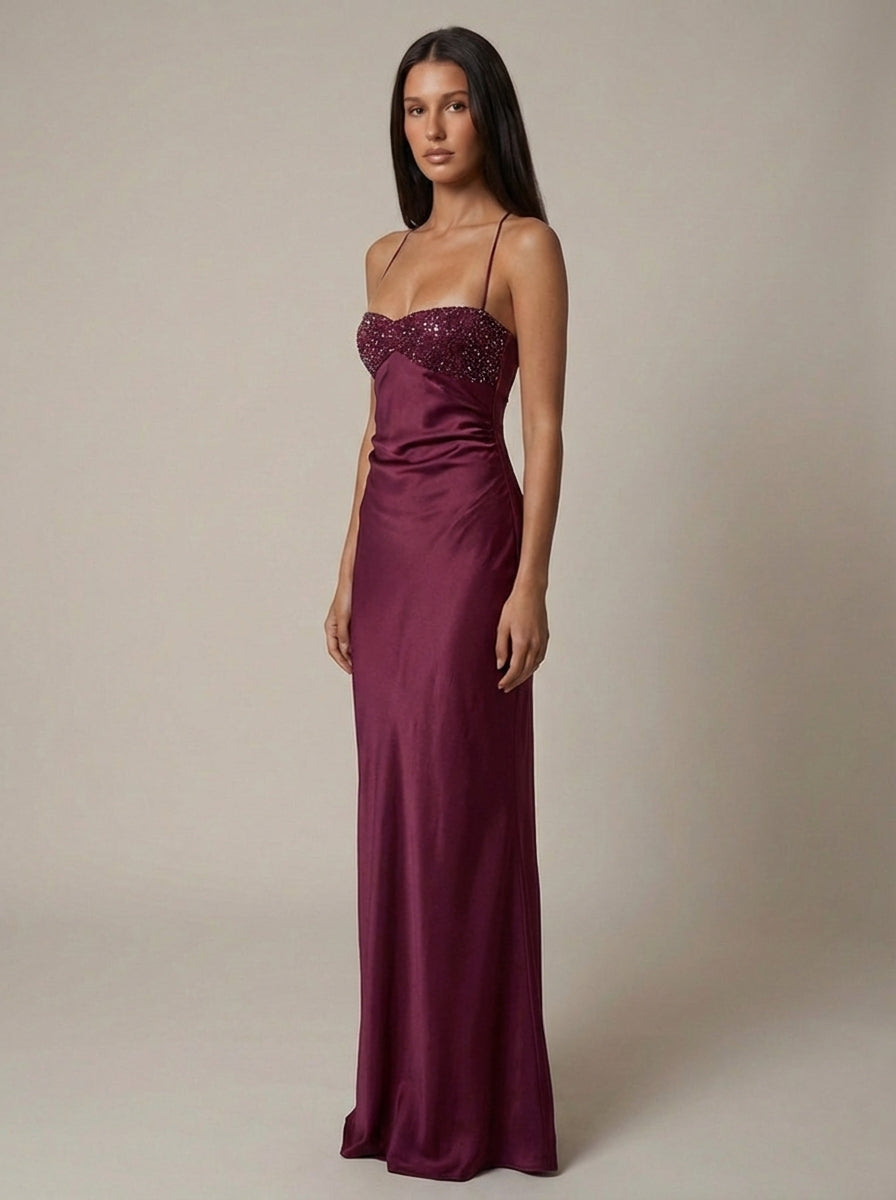 Flowing elegant halter neck maxi gown with delicate pearl beading, a beautiful party dress for women.