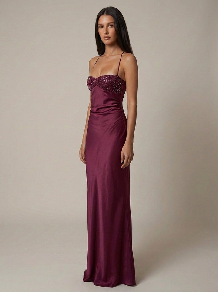 Flowing elegant halter neck maxi gown with delicate pearl beading, a beautiful party dress for women.