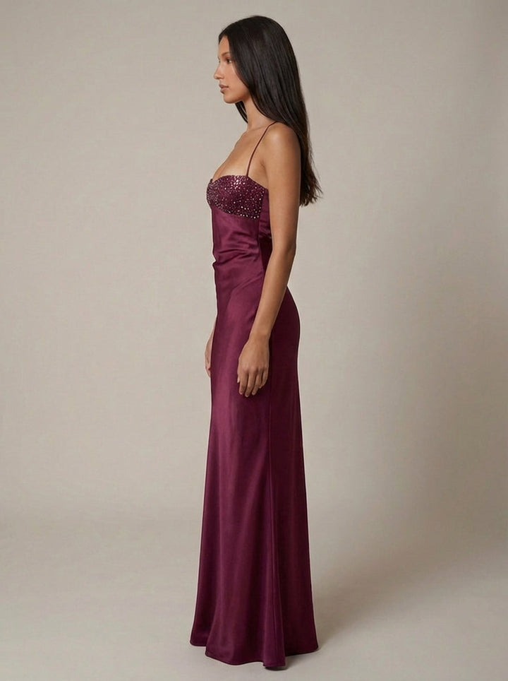 Elegant women's halter neck maxi gown with chic lace-up back, ideal for evening & formal events.
