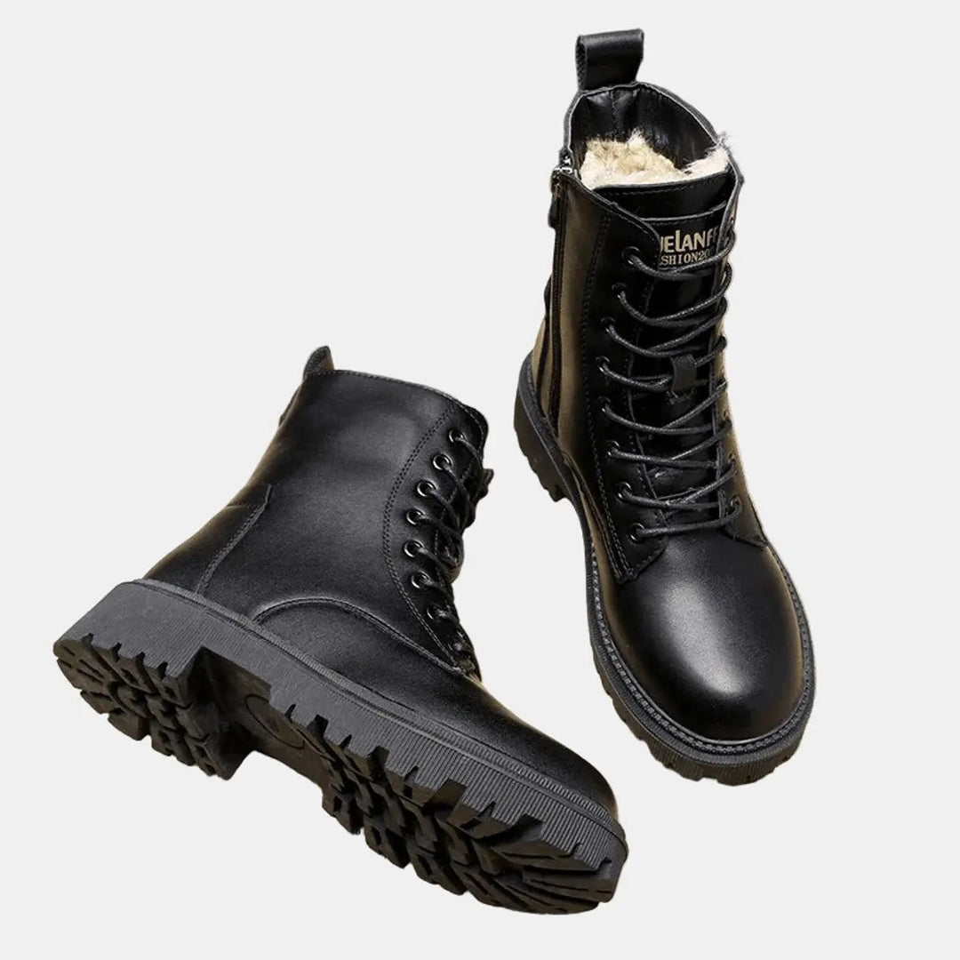 Stylish black lace-up combat boots for women, featuring warm fur lining and a durable chunky sole for winter comfort.