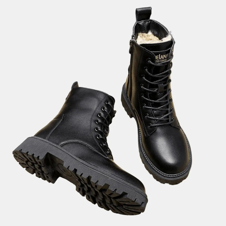 Stylish black lace-up combat boots for women, featuring warm fur lining and a durable chunky sole for winter comfort.