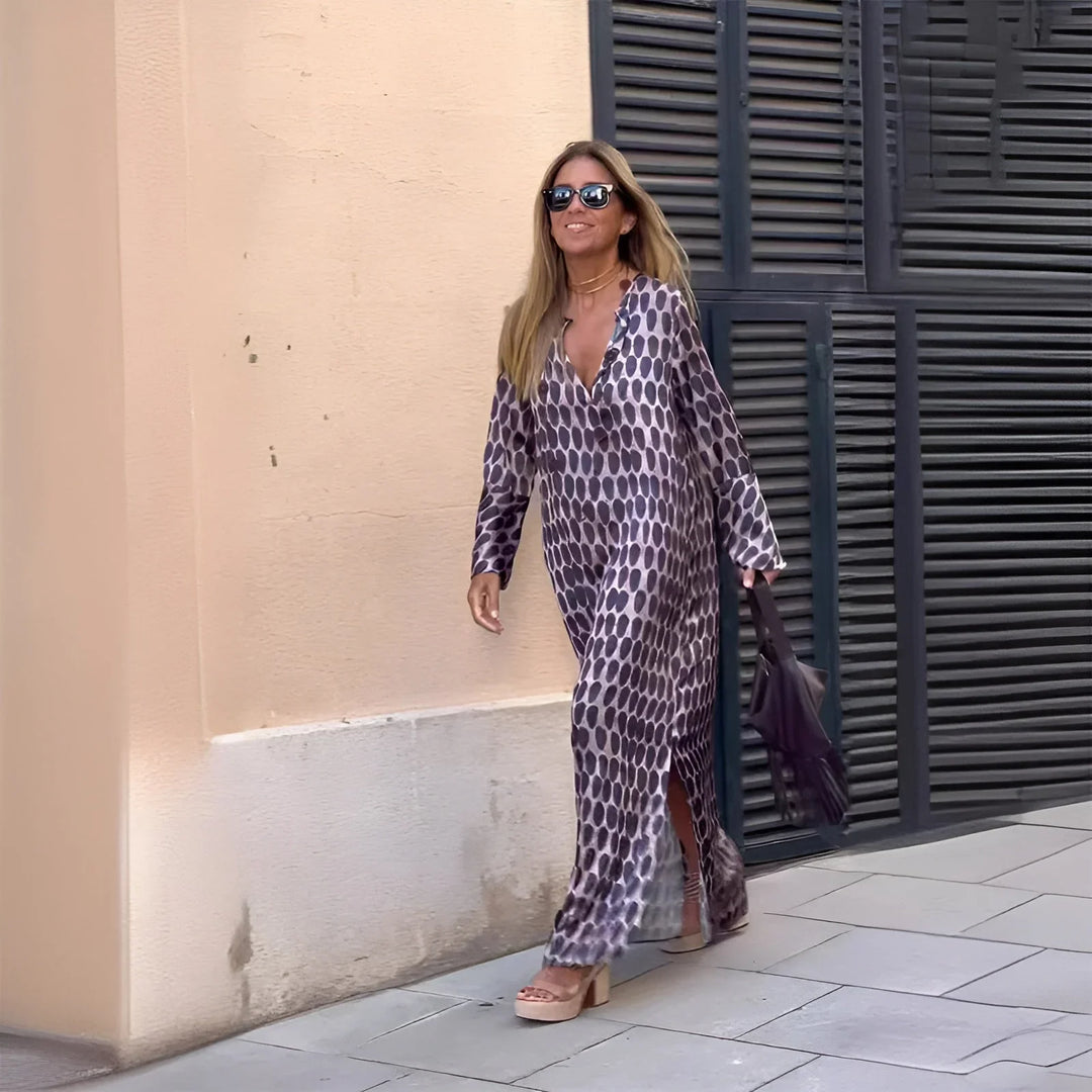 Women's geometric print v-neck maxi dress with long sleeves, ideal for summer bohemian casual chic or occasion wear.