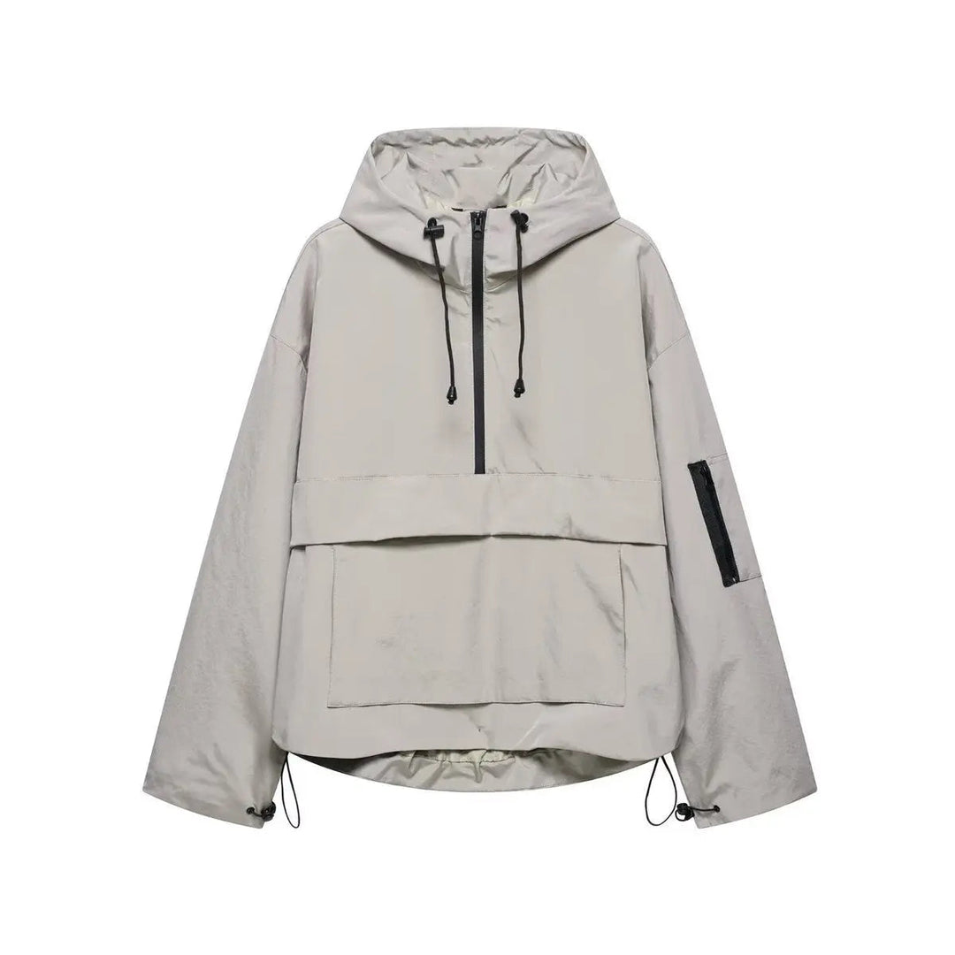Casual women's quilted anorak pullover. Hooded, windproof half-zip jacket, ideal lightweight outerwear for fall.