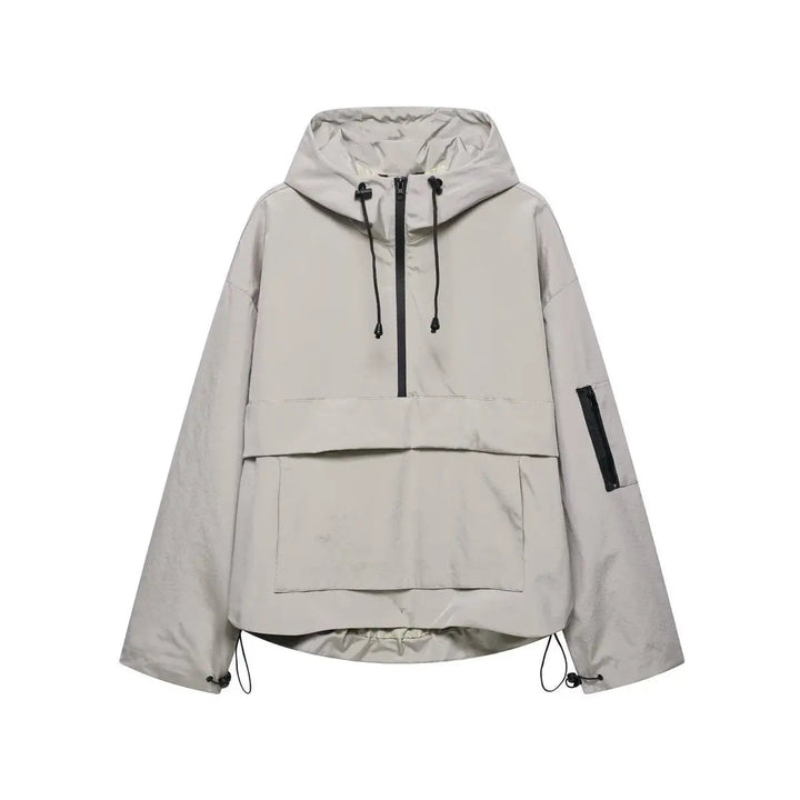 Casual women's quilted anorak pullover. Hooded, windproof half-zip jacket, ideal lightweight outerwear for fall.