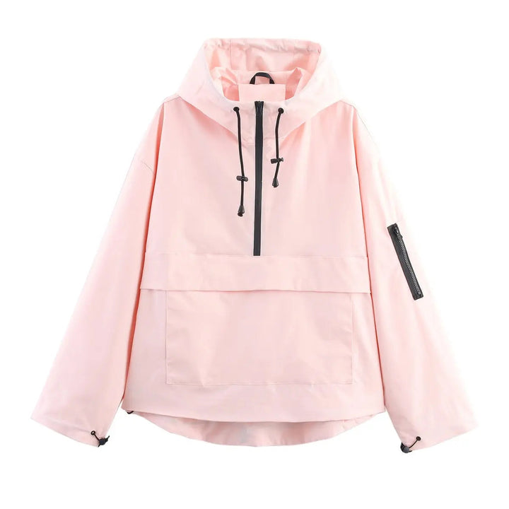 Stylish women's quilted anorak pullover. Hooded, windproof half-zip jacket, essential lightweight outerwear for spring.