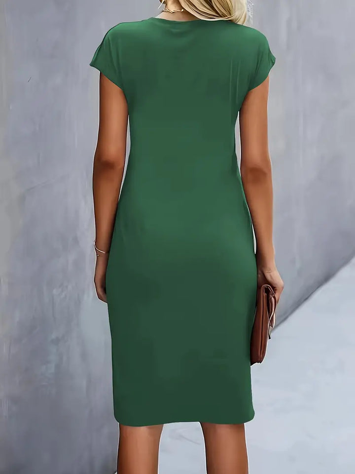 Women's knee-length sheath dress with cap sleeves and ruched waist, offering a flattering fit and elegant silhouette for any 