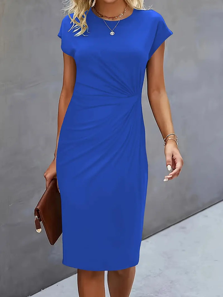 Women's knee-length sheath dress with cap sleeves and ruched waist, offering a flattering fit and elegant silhouette for any 