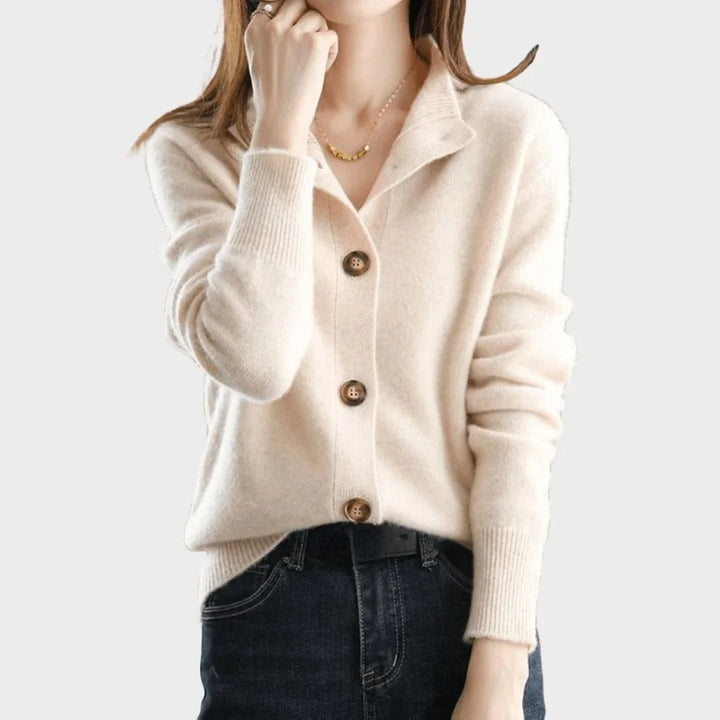 Cozy women's button-up knit sweater with a sophisticated stand-collar and stylish ribbed cuffs.