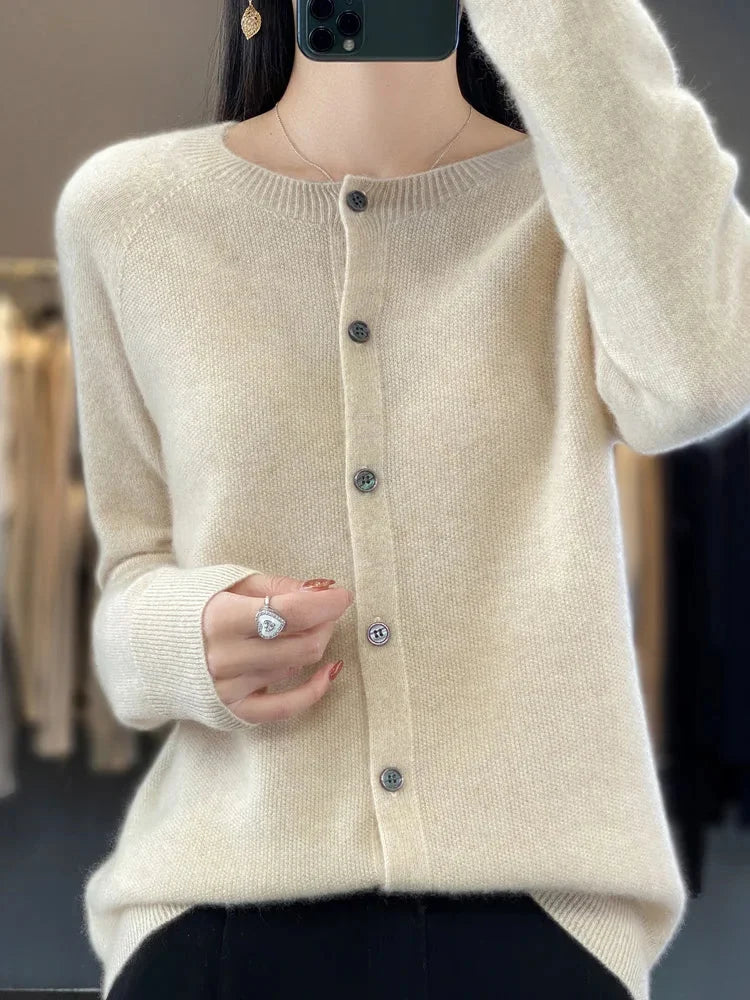 Elegant women's crew neck knit cardigan sweater with button front, perfect for stylish layering.