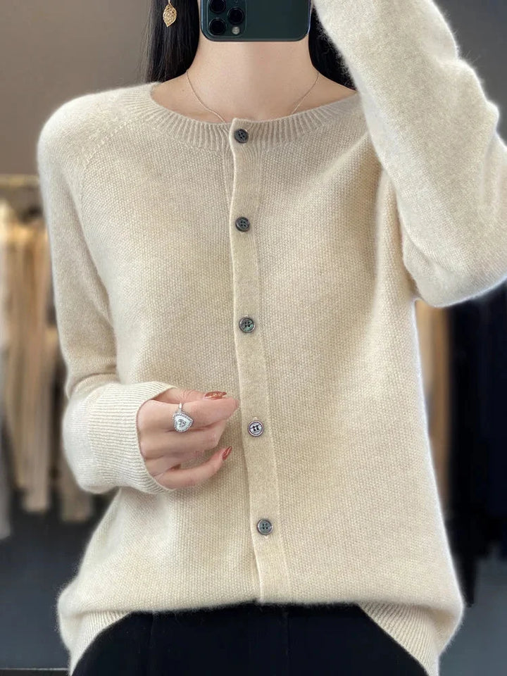 Elegant women's crew neck knit cardigan sweater with button front, perfect for stylish layering.