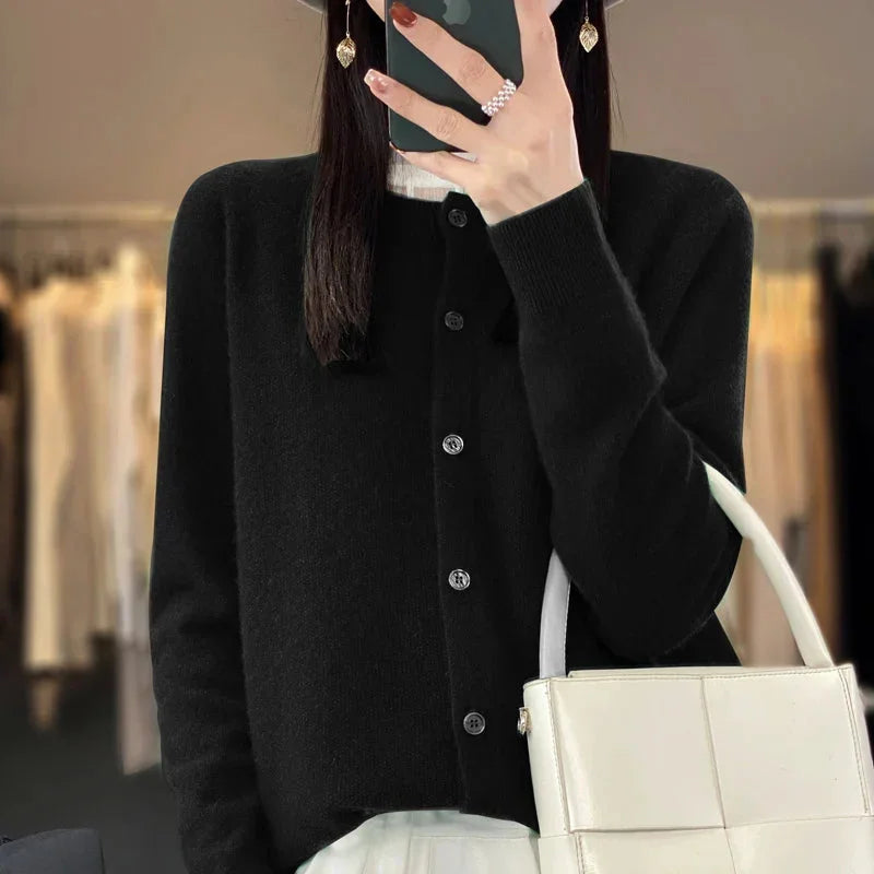 Warm & stylish women's knit cardigan sweater, button-front for cozy comfort and elegant style.