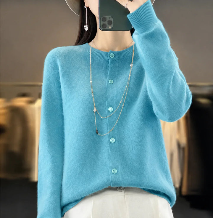 Stylish women's knit button-front cardigan, long sleeve & crew neck design, perfect everyday top.
