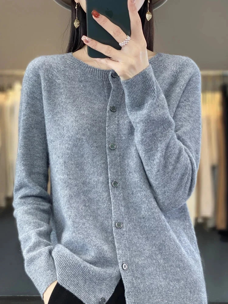 Cozy long-sleeve women's knit cardigan, button-front, versatile for everyday layering style.
