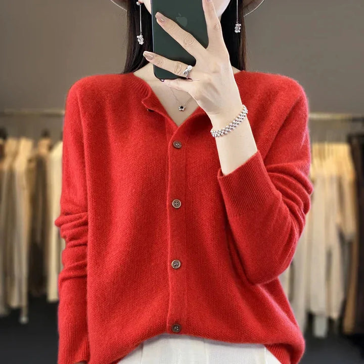 Elegant women's button-front knit cardigan, long sleeve, for stylish versatile layering looks.