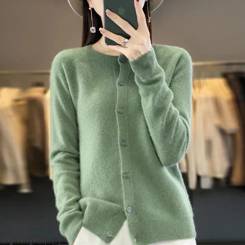 Women's cozy knit button-front cardigan sweater, a stylish & comfortable layering piece.
