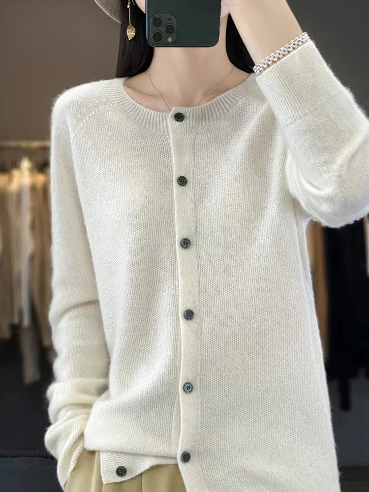 Comfortable women's button-front knit cardigan sweater, cozy long-sleeve design for comfort wear.