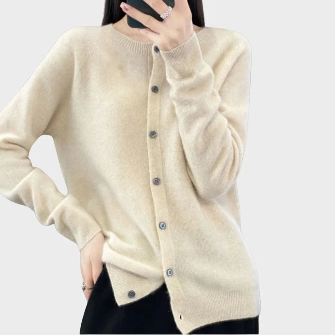 Casual women's long-sleeve crew-neck cardigan sweater. Modeled for everyday comfort & style.