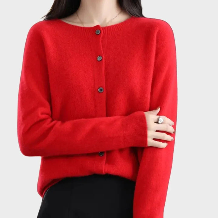 Stylish women's long-sleeve crew-neck cardigan sweater. Essential button-front knitwear for versatile fashion.