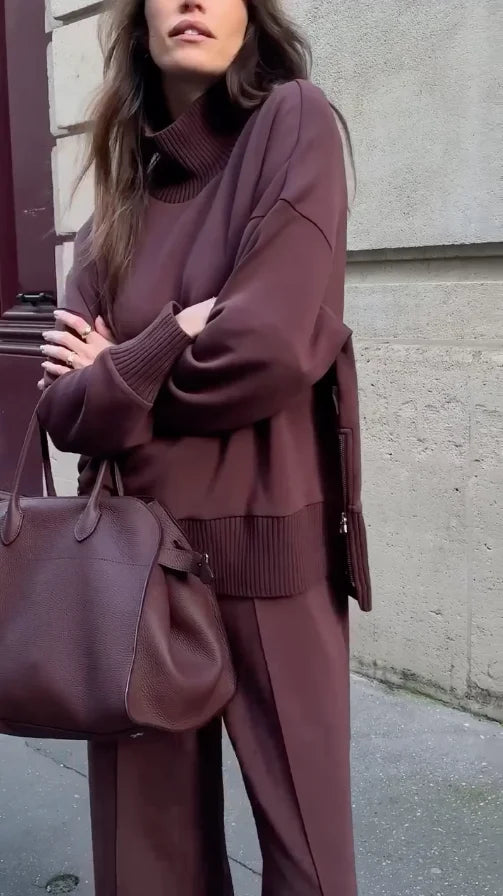 Stylish two-piece knit set featuring a ribbed turtleneck sweater and comfortable wide-leg pants.