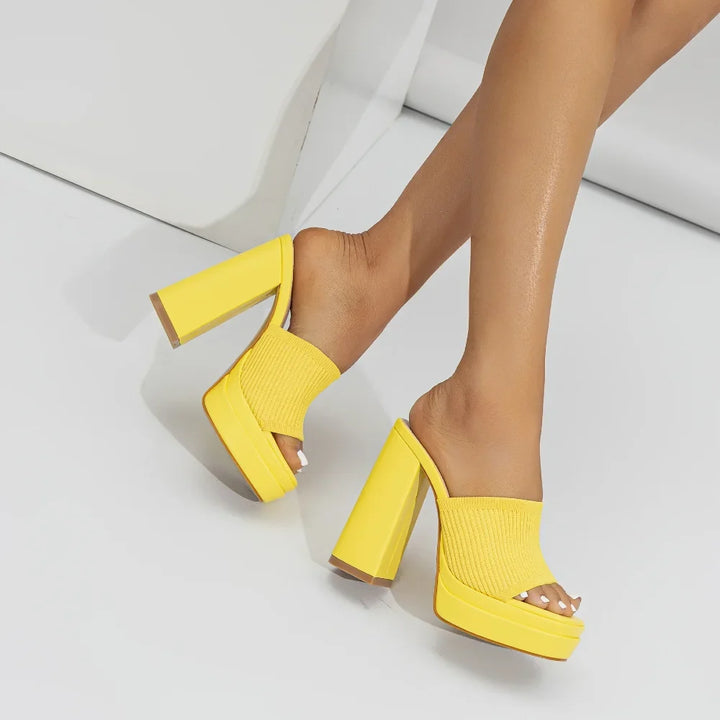 Elegant women's platform sandals with adjustable straps, open toe, and a comfortable chunky heel.