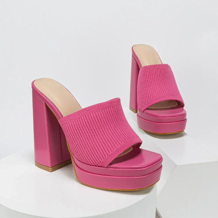 Chic women's platform sandals featuring an open toe, sturdy chunky heel, and all-day comfort.