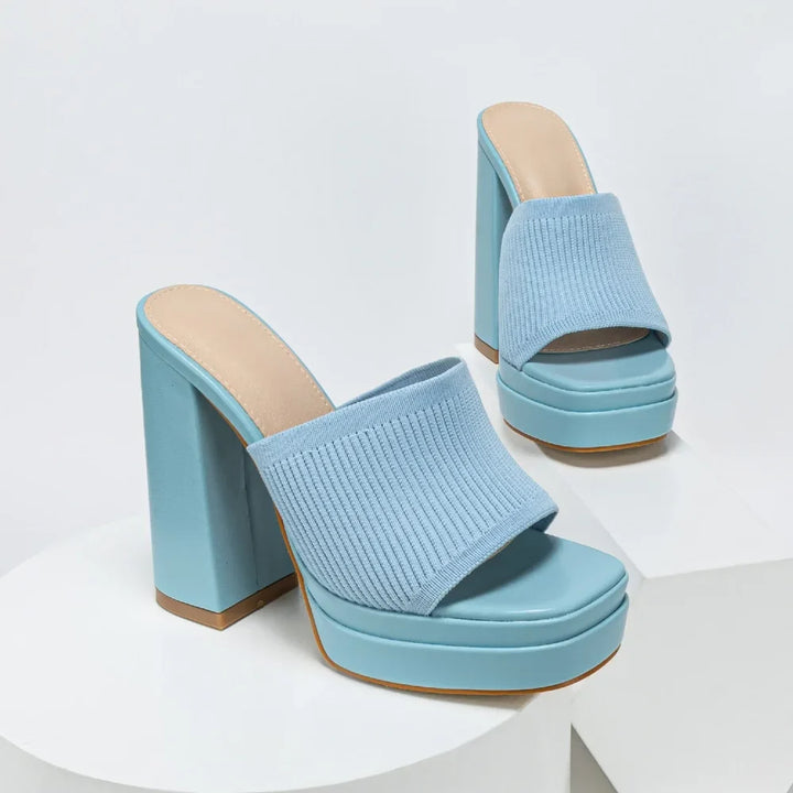 Comfortable women's open-toe platform sandals with a supportive chunky heel & adjustable straps.