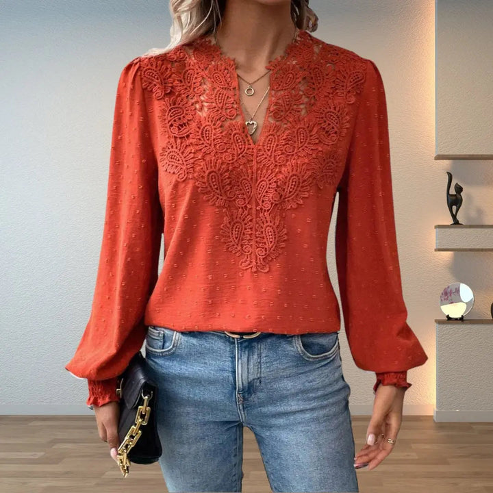Women's elegant lace detail blouse with long smocked sleeves and a flattering V-neck, perfect for romantic vintage style.