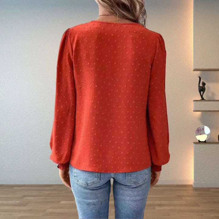 Versatile women's long sleeve V-neck blouse with delicate lace details, ideal for elegant or everyday fashion.