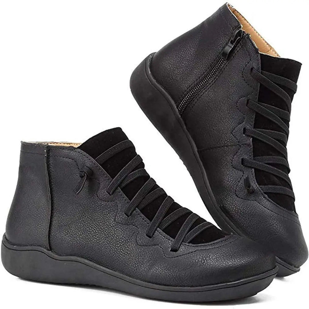 Comfortable women's flat ankle boots. Ideal for autumn & winter, with lace-up style & side zip.