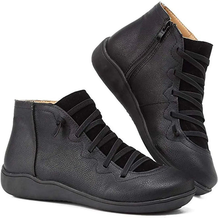 Comfortable women's flat ankle boots. Ideal for autumn & winter, with lace-up style & side zip.