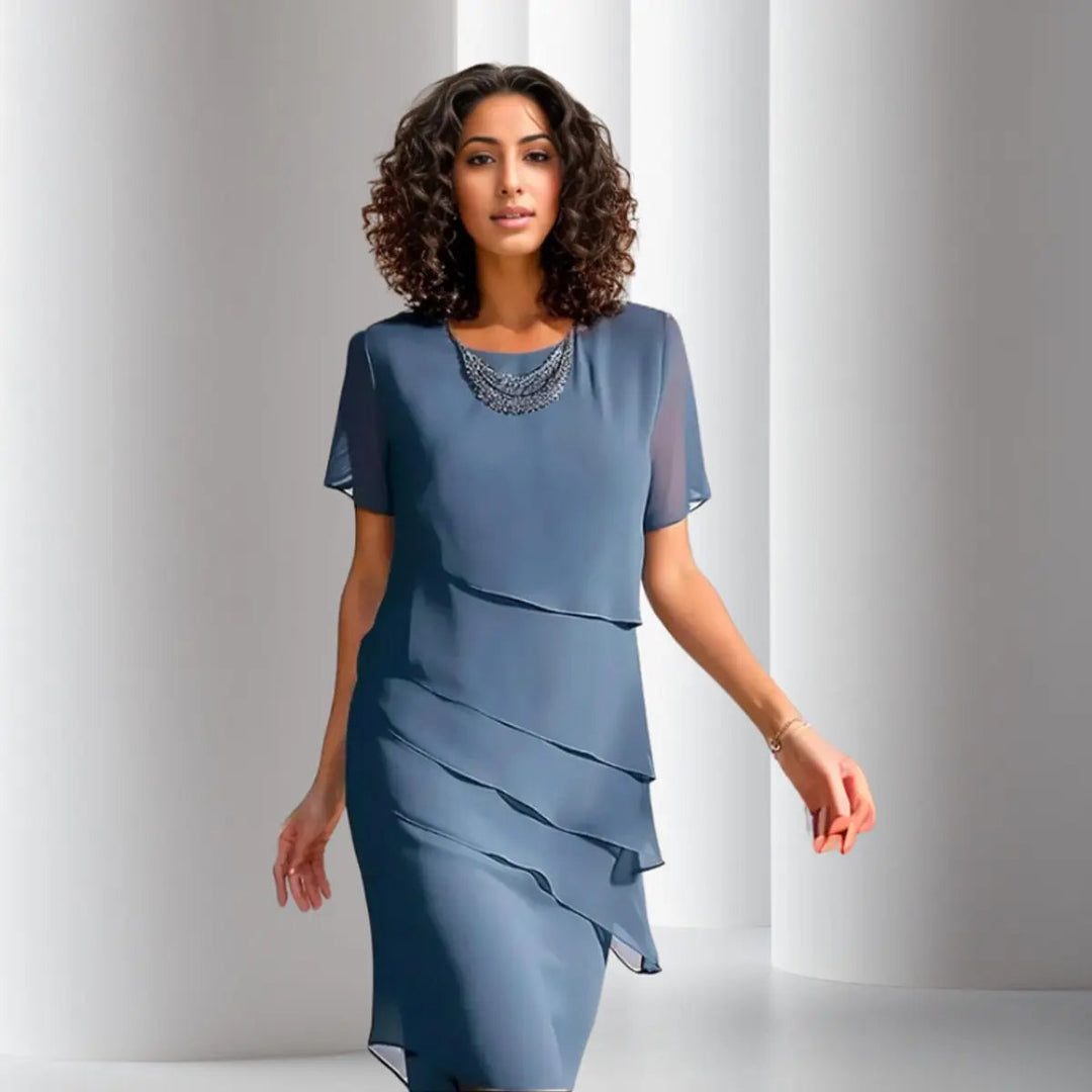 Comfortable & elegant women's short sleeve layered midi cocktail dress for party wear. Ideal for formal events.
