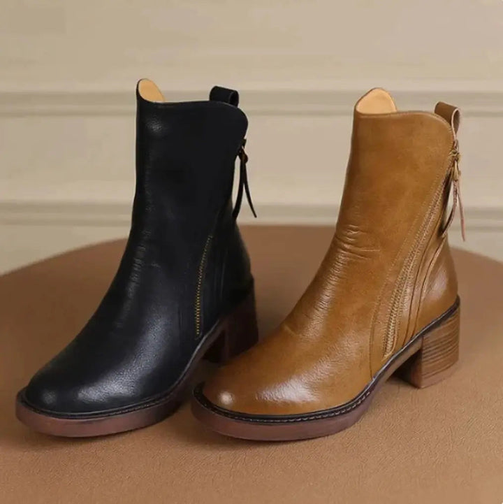 Stylish women's leather block-heel ankle boots. Features a chic design & practical side zip. Great for fall.