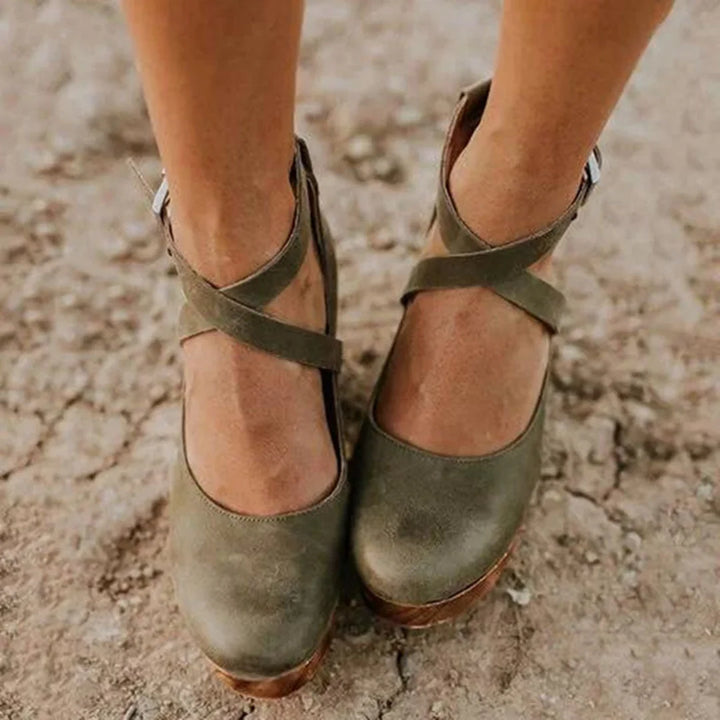 Versatile women's closed-toe Mary-Jane wedge heels. Transition seamlessly from day to night with this chic platform.